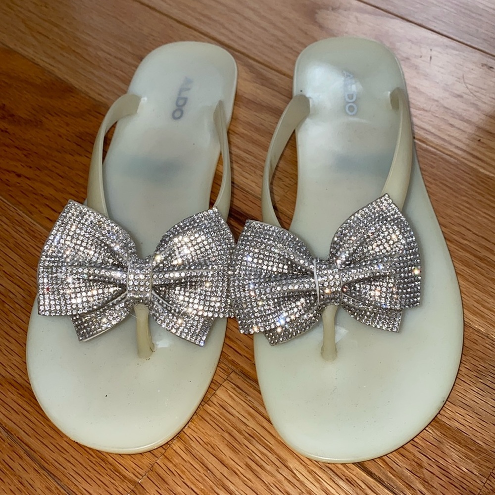 Aldo Jelly Rhinestone Flip Flops Size 7 worn once and purchased in Las Vegas!